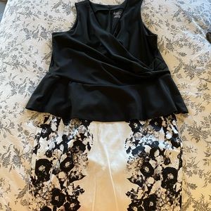 Sleeveless top and knee length skirt